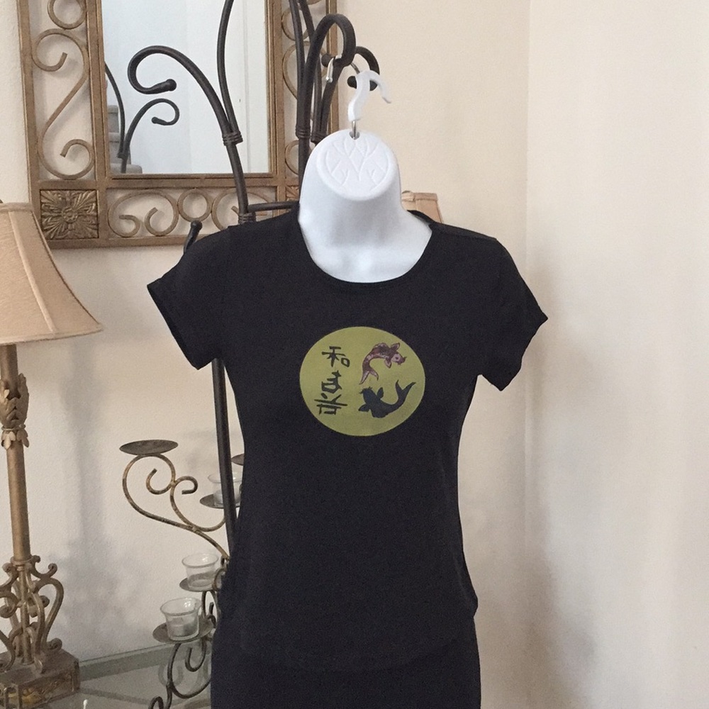 579 tee shirt size small black and green